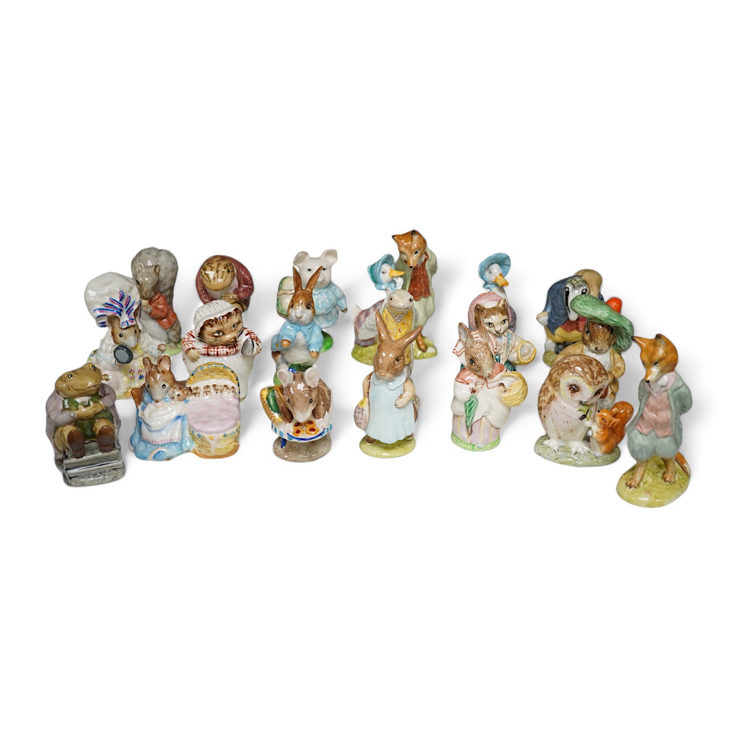 A collection of nineteen Beswick ‘Beatrix Potter’ figures, tallest Foxy Whiskered Gentleman, 12cm high. Condition - fair to good